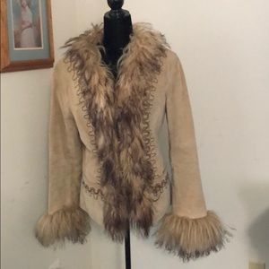 Faux fur trimmed 100% suede jacket.